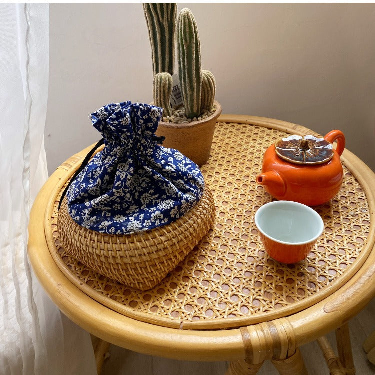 Charming storage bag made of hand-woven rattan Acalora