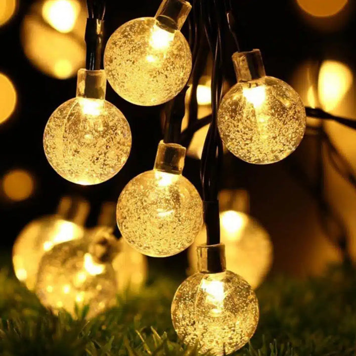 String lights with 30 balls – Charging via solar panel | Kalsten