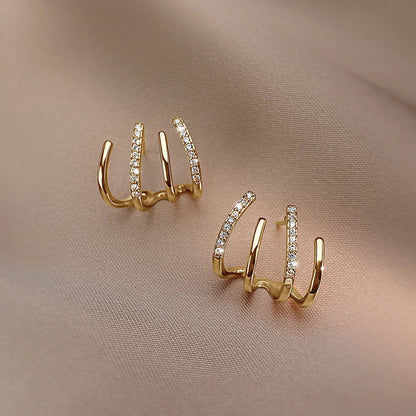 Skanto | Twisted Earrings | Elegant Design | Gold or Silver