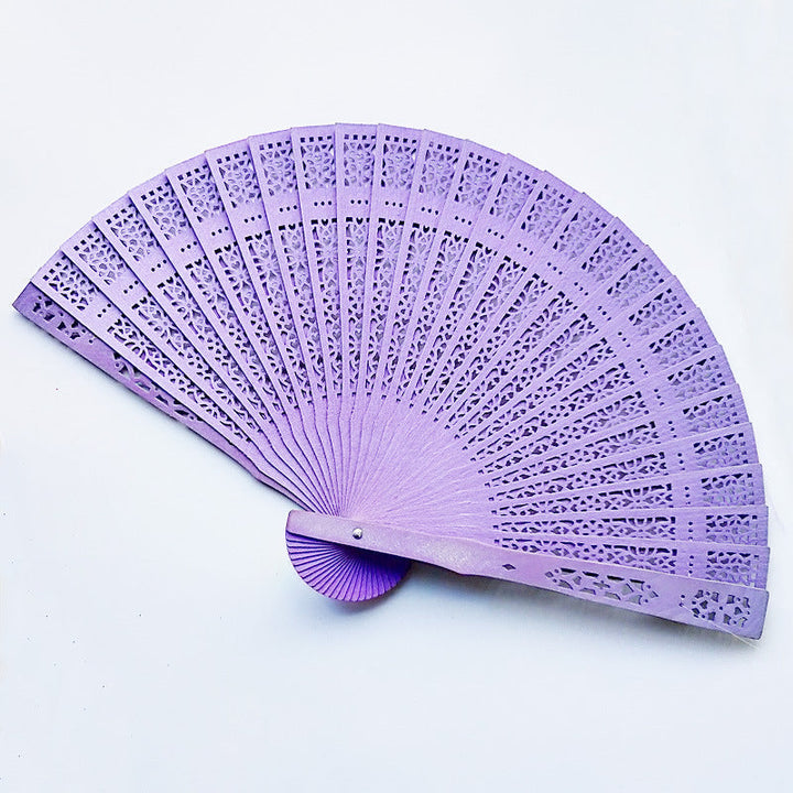 Women's fan made of elegant, intricately perforated material Kalsten