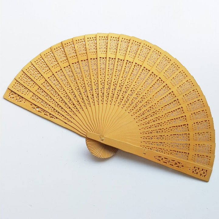 Ladies elegant fan made of high-quality plastic with artistic cutouts Kalsten