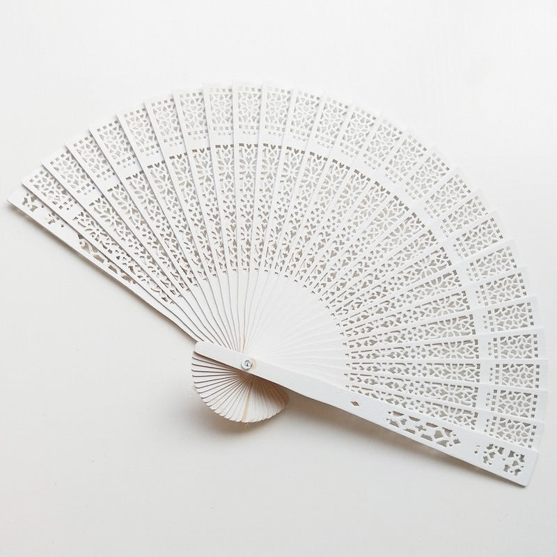 Ladies elegant fan made of high-quality plastic with artistic cutouts Kalsten