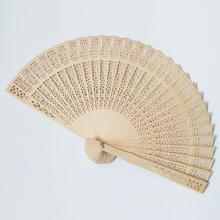 Ladies elegant fan made of high-quality plastic with artistic cutouts Kalsten