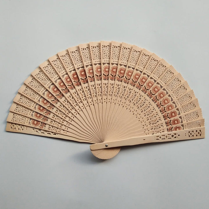 Ladies decorative hand fan made of high-quality wood with intricate cut-out work Kalsten