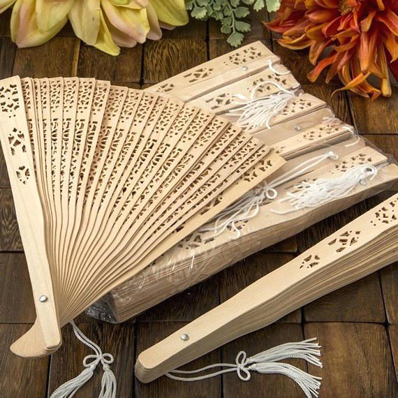 Ladies elegant fan made of high-quality plastic with artistic cutouts Kalsten
