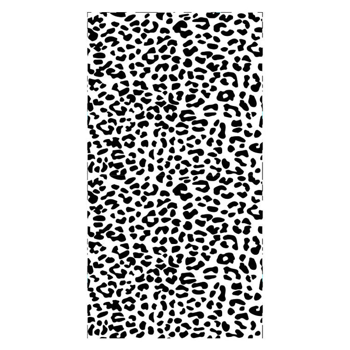Beach towel with striking leopard motif and colorful accents Kalsten