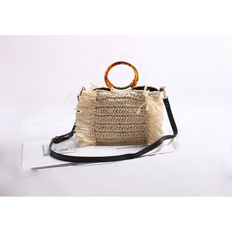 Handmade raffia shoulder bag with fringed accents Kalsten