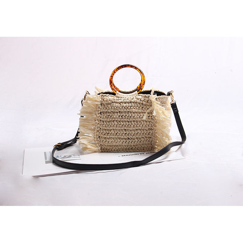 Handmade raffia shoulder bag with fringed accents Kalsten