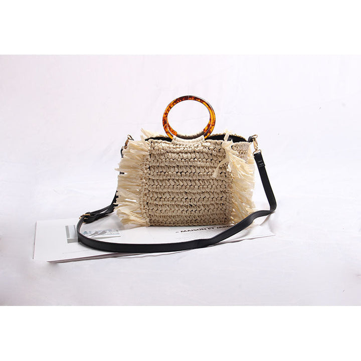 Handmade raffia shoulder bag with fringed accents Kalsten