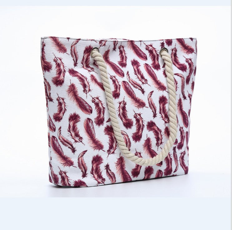 Beach bag with playful feather pattern Kalsten