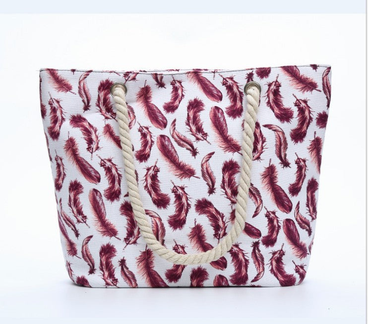 Beach bag with playful feather pattern Kalsten