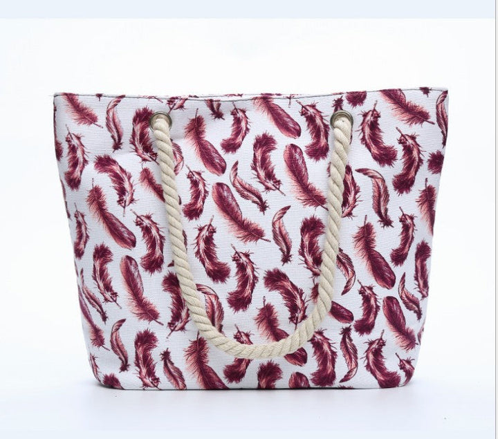 Beach bag with playful feather pattern Kalsten
