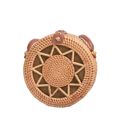 Elegant round handbag made of woven rattan Acalora