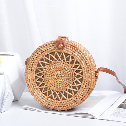 Elegant round handbag made of woven rattan Acalora