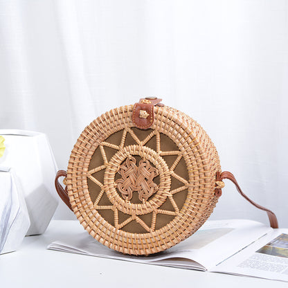Elegant round handbag made of woven rattan Acalora