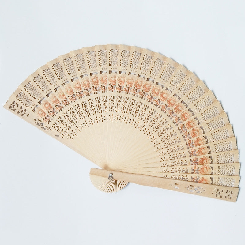 Ladies decorative hand fan made of high-quality wood with intricate cut-out work Kalsten