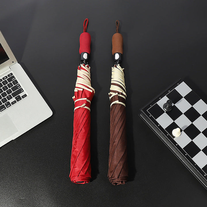 Women's wind-resistant folding umbrella with ergonomic handle Kalsten