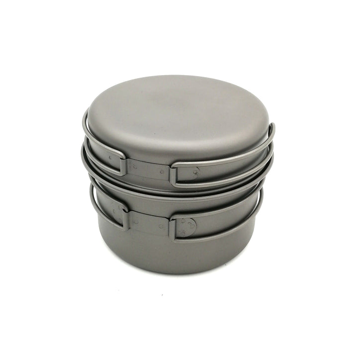 ultra-light titanium backpacking cook set with nesting pots, non-stick finish, foldable handles and compact micro gas burner Kalsten