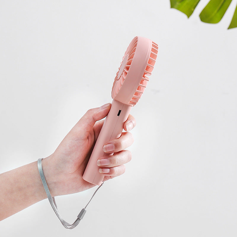 Unisex nan compact portable hand fan with rechargeable battery and USB charging port quiet operation self-standing Kalsten
