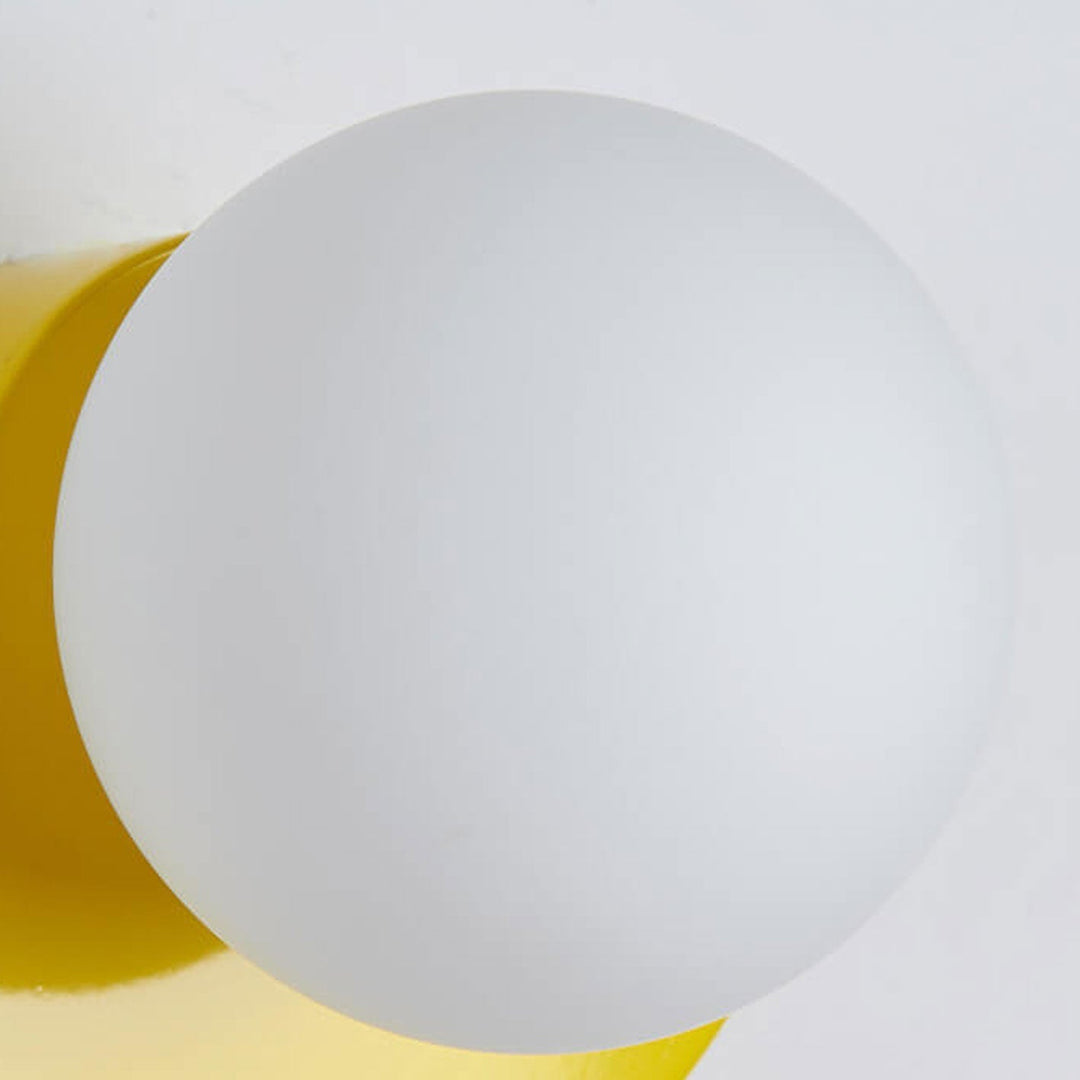 Glass Globe Wall Light with Color Base Kalsten