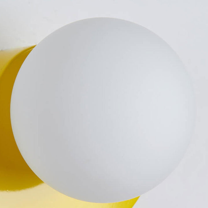 Glass Globe Wall Light with Color Base Kalsten