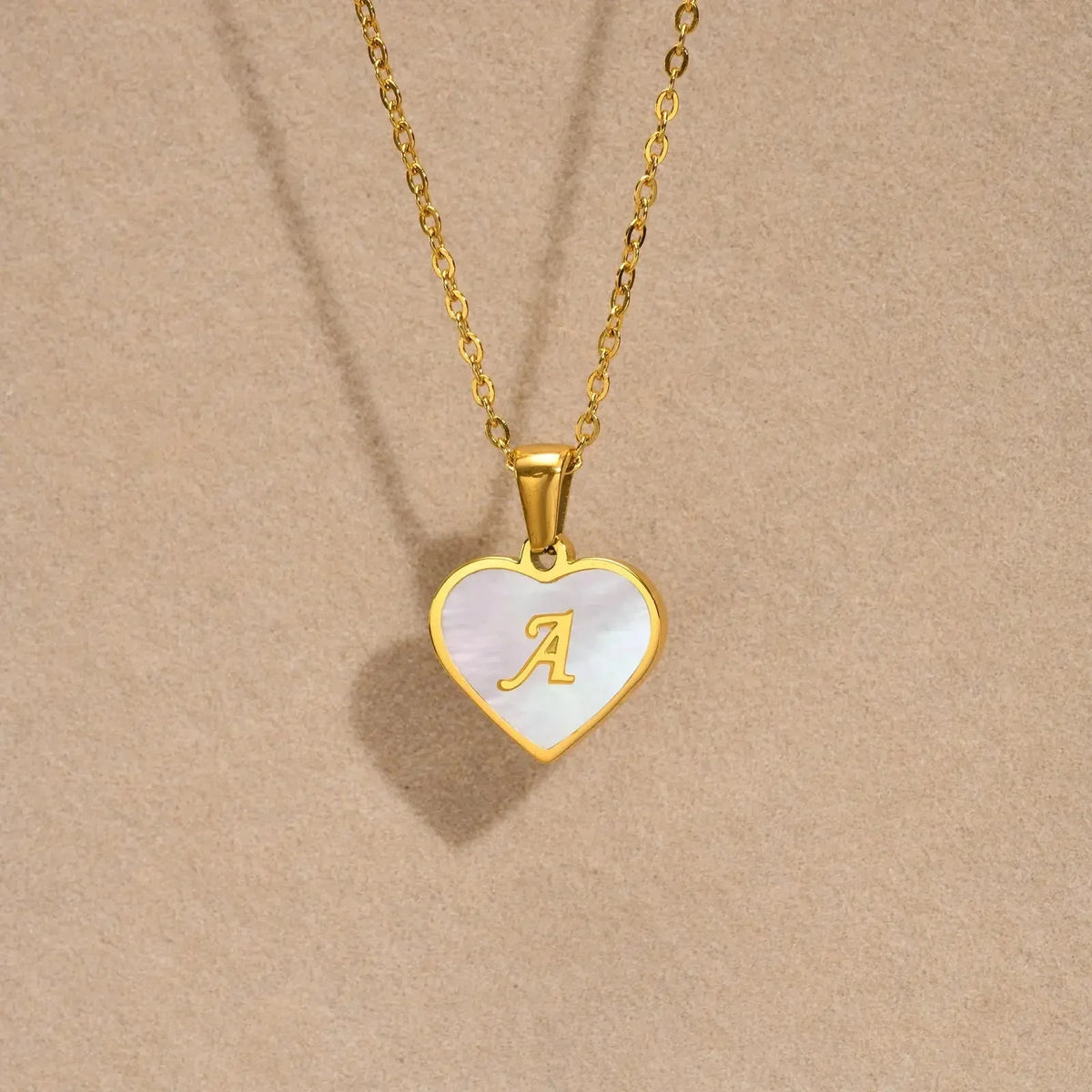 Skanto | 18k Pearl Heart Initial Necklace
