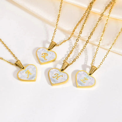 Skanto | 18k Pearl Heart Initial Necklace