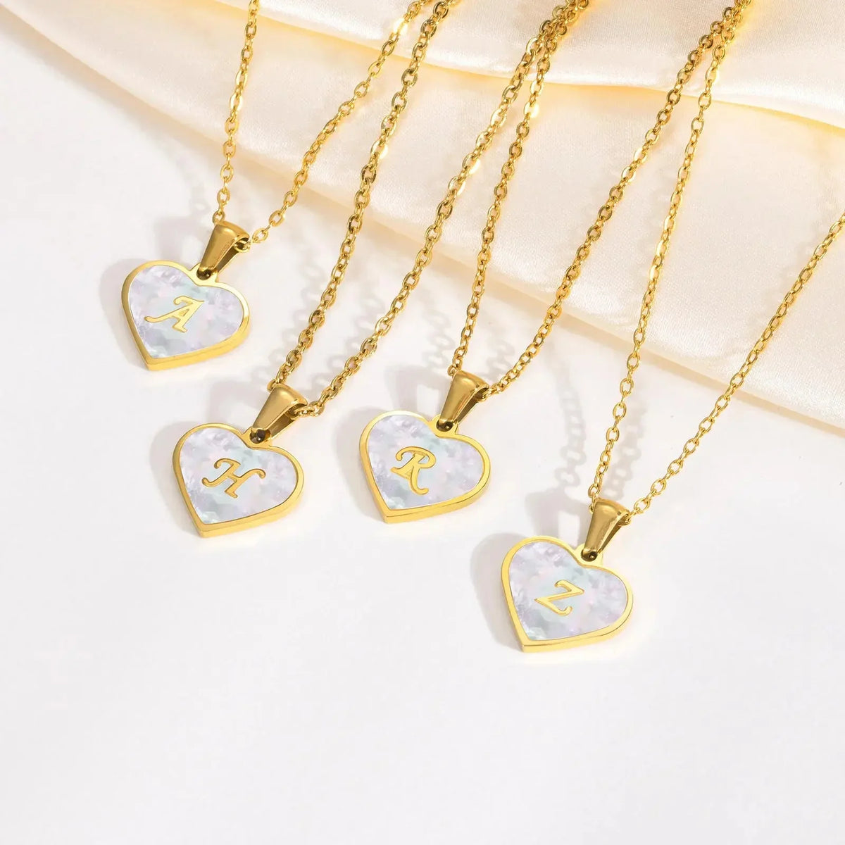 Skanto | 18k Pearl Heart Initial Necklace