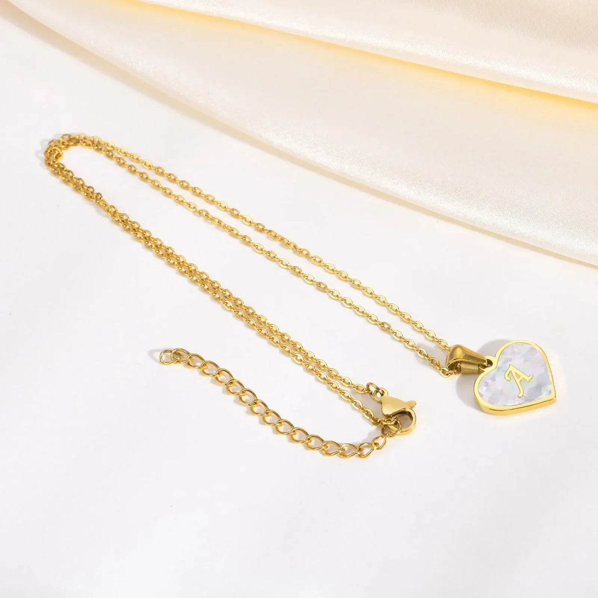 Skanto | 18k Pearl Heart Initial Necklace