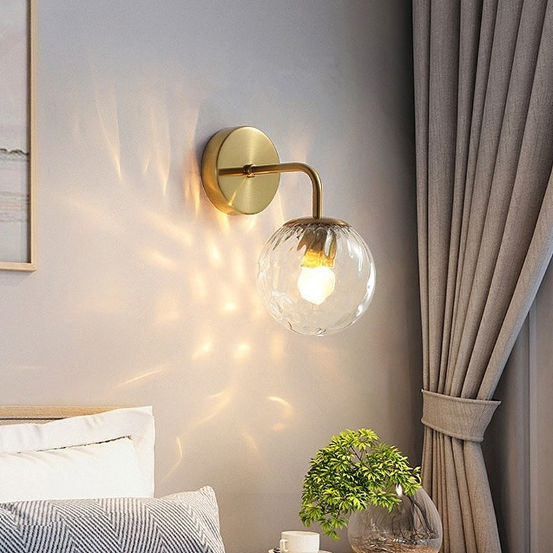Ball Shaped Wall Lamp Minimalist Clear Rippling Glass 1-Light Bedroom Wall Mounted Lighting with Bent Arm in Black/Gold | Kalsten