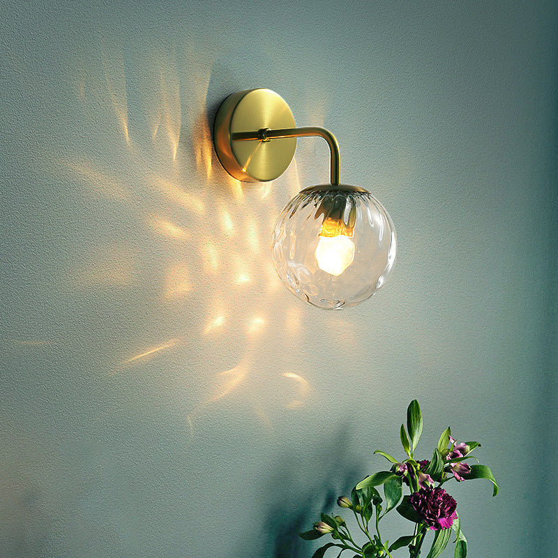 Ball Shaped Wall Lamp Minimalist Clear Rippling Glass 1-Light Bedroom Wall Mounted Lighting with Bent Arm in Black/Gold | Kalsten