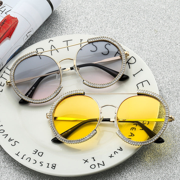 Ladies sunglasses with glamorous rim and innovative design Kalsten