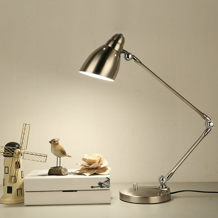 Industrial table lamp made of metal with adjustable arm and clock-shaped shade | Kalsten