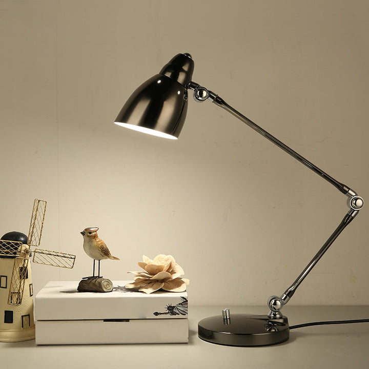 Industrial table lamp made of metal with adjustable arm and clock-shaped shade | Kalsten