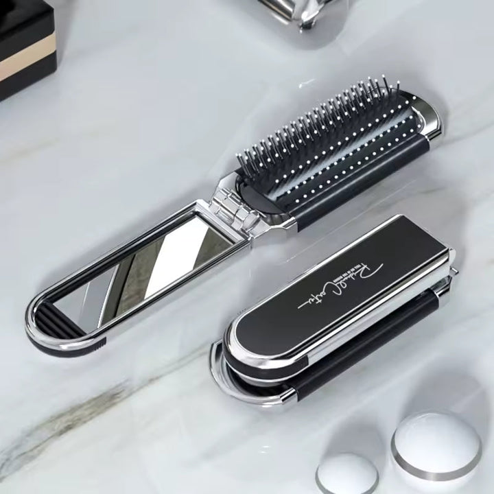 Compact hairbrush with integrated mirror | Kalsten