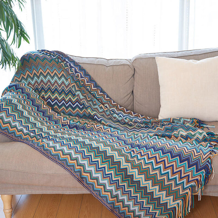 Colorful striped throw blanket with tassels