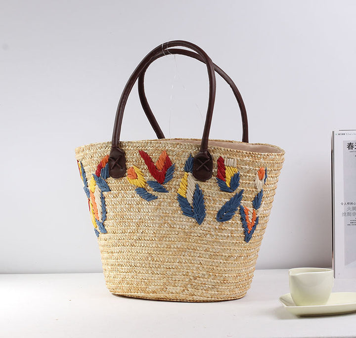 Braided beach bag with colorful embroidery pattern Kalsten