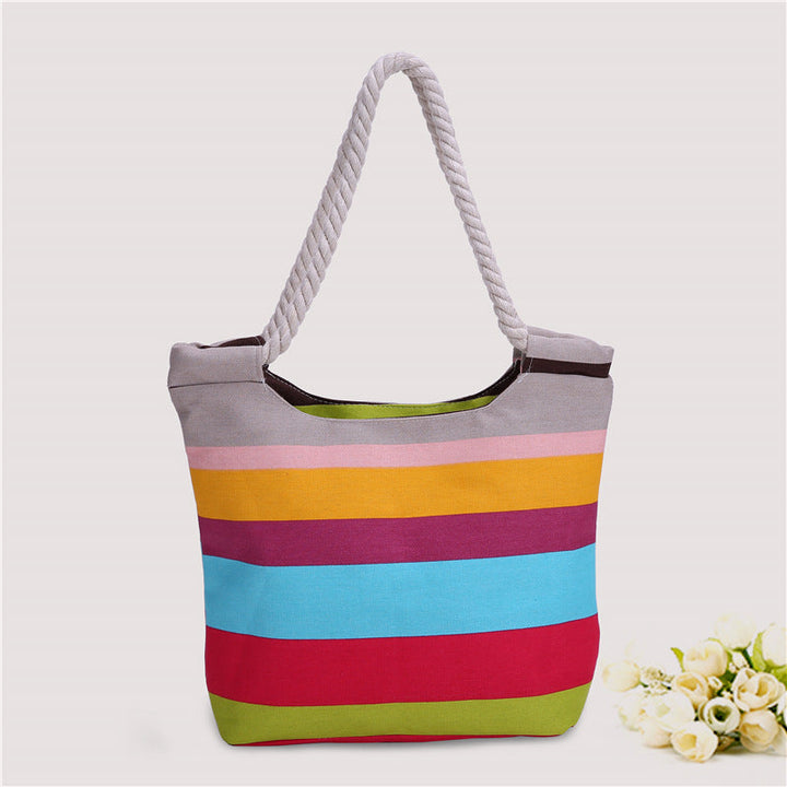 Beach bag made of durable canvas with colorful striped pattern Kalsten