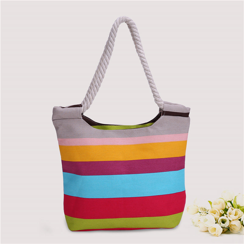Beach bag made of durable canvas with colorful striped pattern Kalsten
