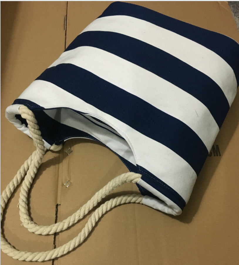 Beach bag made of durable canvas with colorful striped pattern Kalsten