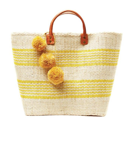 Stylish basket bag with playful pompons Kalsten