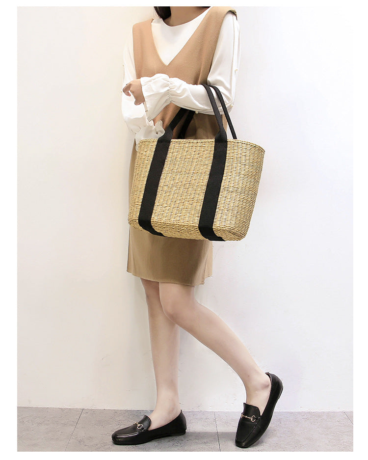 Spacious straw tote bag with comfortable, reinforced handles Kalsten