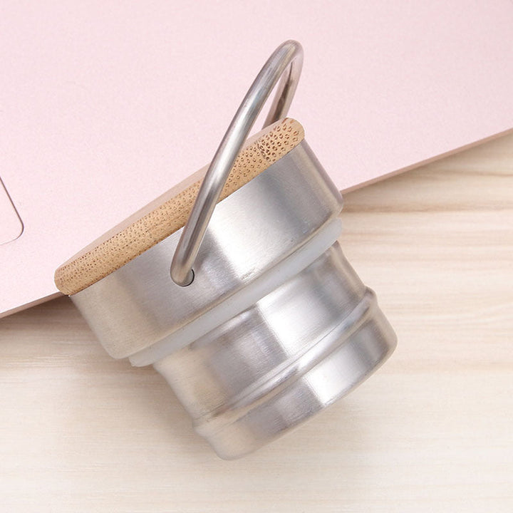 Ladies Elegant Stainless Steel Drinking Bottle with Sustainable Wood Cap Kalsten