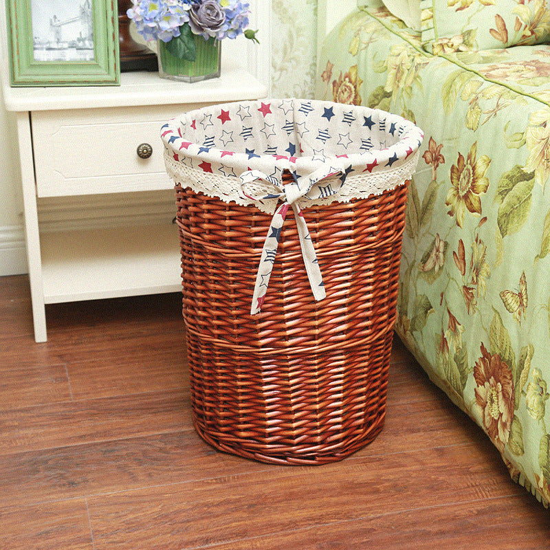 Women's laundry basket made of woven natural material with decorative fabric lining Kalsten