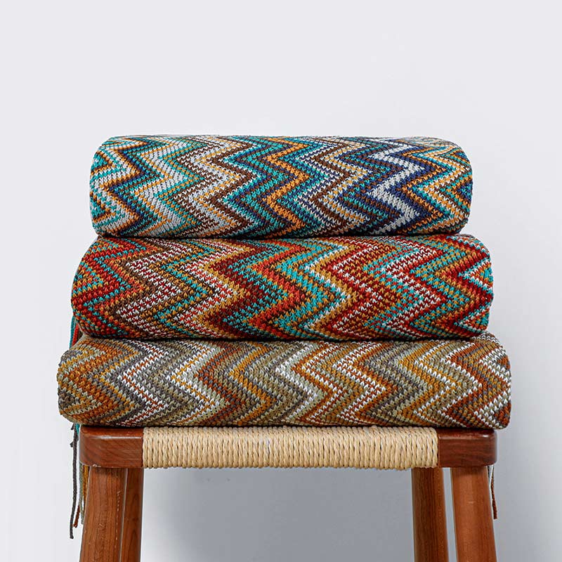 Colorful striped throw blanket with tassels