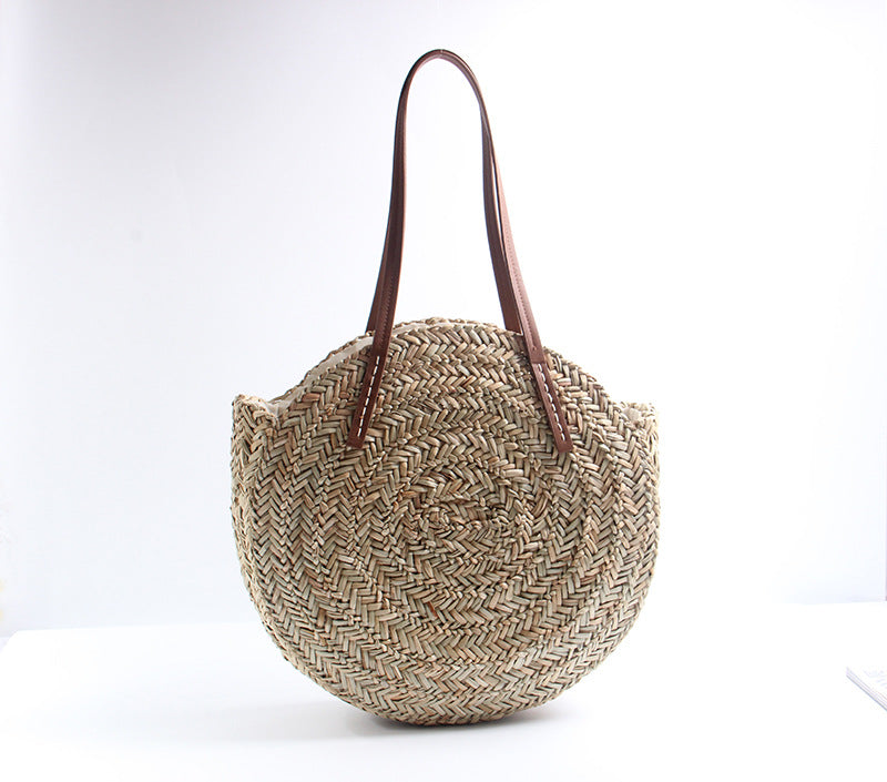 Braided straw beach bag with elegant leather handles Kalsten