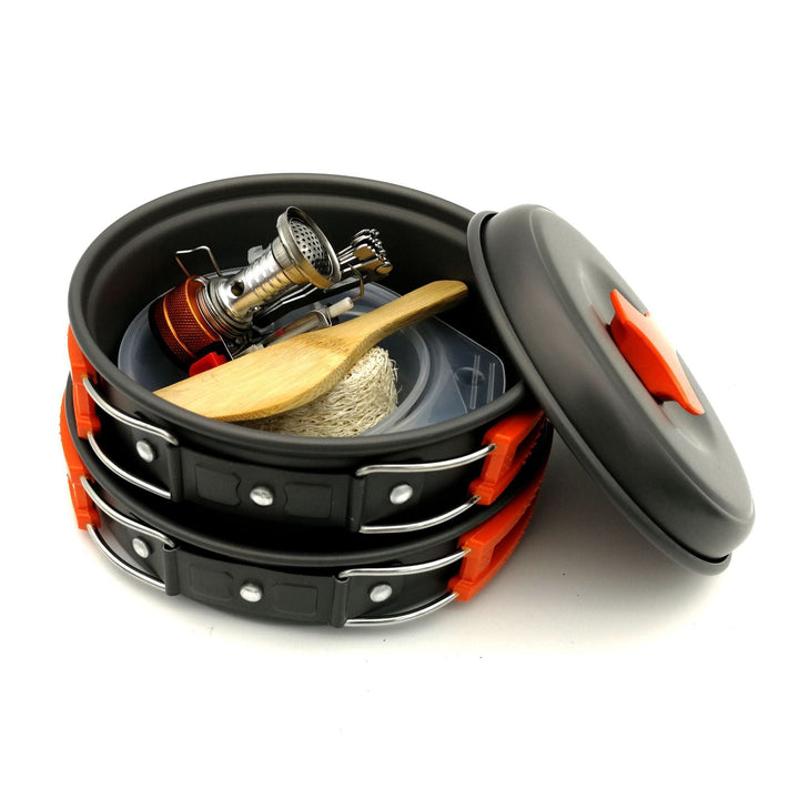 lightweight nesting camping cookware set with folding heat-resistant handles integrated compact stove and utensils Kalsten