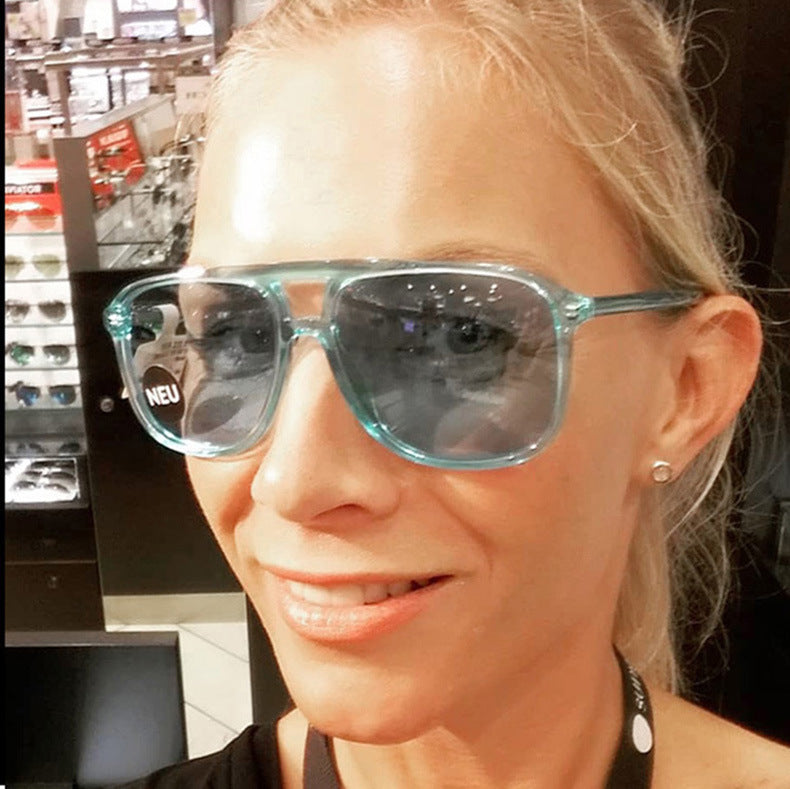 Women's fashionable sunglasses with transparent frame and blue lenses Kalsten