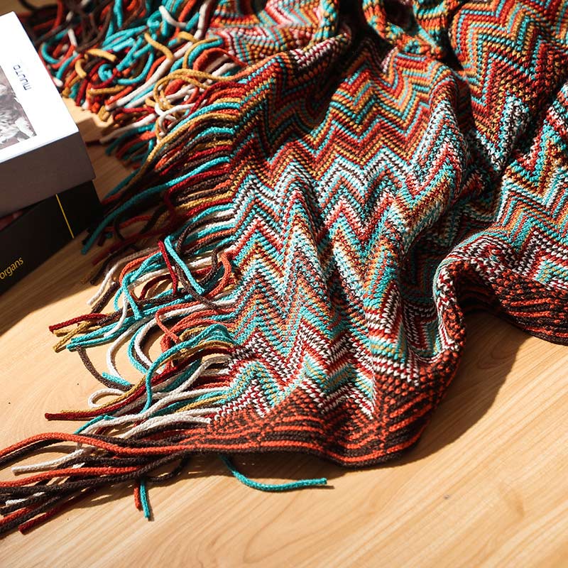 Colorful striped throw blanket with tassels