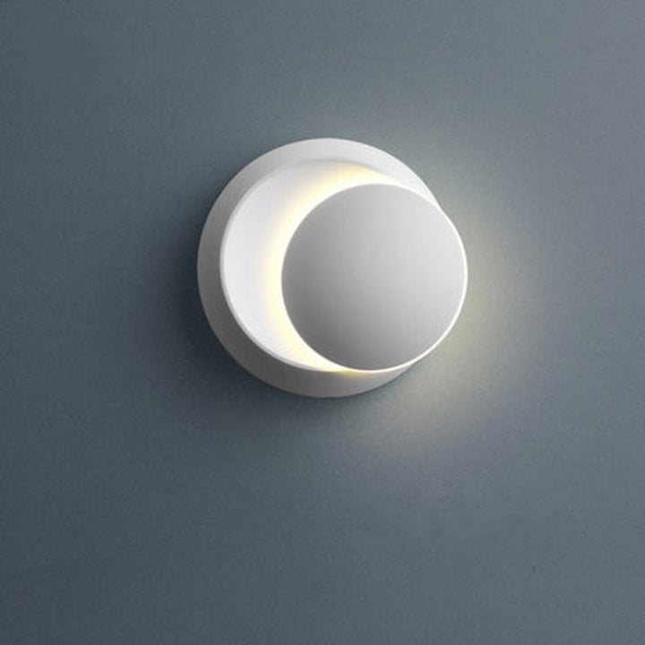 Contemporary Nordic Iron Round Eclipse Rotatable LED Wall Light for Nightstand | Kalsten